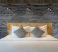 Interior beautiful bedroom with granite stone decorative brick wall Royalty Free Stock Photo