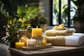 Beautiful, relaxing SPA area with towels, yellow candles and green plants. Advertising of wellness Royalty Free Stock Photo