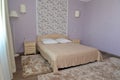 Interior of a bedroom of a double hotel room in light tones Royalty Free Stock Photo