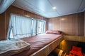 Interior of a bedroom on a liveaboard dive boats