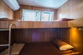 Interior of a bedroom on a liveaboard dive boats