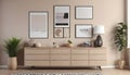 Interior of a beige living room featuring a dresser and posters