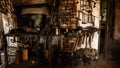 Interior of Blacksmith forge with tools hanging on wall and anvil and hammer ready to be used. Furnace formant Royalty Free Stock Photo