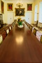 Interior of the Borch Palace - historic throne hall with long vintage conference table. Warsaw, Poland. Royalty Free Stock Photo
