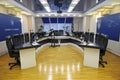 Interior of the briefing room of the press centre of Ministry of Internal Affairs of Ukraine, table, chairs, microphones, monitors Royalty Free Stock Photo