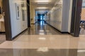 Interior of bright, empty school hallway: back to school concept, coronavirus concept
