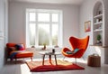Interior of a bright living room with a terracotta armchair with a blanket thrown over it, a coffee table and a large window Royalty Free Stock Photo