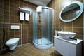 Interior of brown bathroom with bathtub, sink and toilet