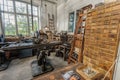 Interior of building of the mechanical workshop on Skansen with ancient milling, turning and drilling machines, which powered via