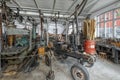 Interior of building of the mechanical workshop on Skansen with ancient milling, turning and drilling machines, which powered via