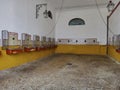 interior of a bullfight arena showing the stables