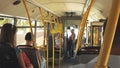 Interior of the bus with passengers.