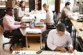 Interior Of Busy Architect's Office With Staff Working