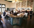 Interior Of Busy Cocktail Bar In Restaurant With Staff Serving Customers Royalty Free Stock Photo