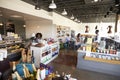 Interior Of Busy Delicatessen With Customers