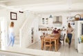 Interior Of Busy Family Home With Blurred Figures Royalty Free Stock Photo