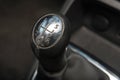 Car interior with closeup of gear stick for manual transmission Royalty Free Stock Photo