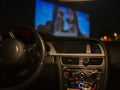 Interior of a car in a drive-in theater Royalty Free Stock Photo