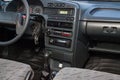 The interior of the car lada 2114 samara with a view of the steering wheel, dashboard, seats and multimedia system with light gray