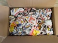 Interior of cardbaord box filled with multiple jammed newspapers