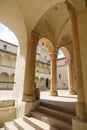 interior of the Castle Torrechiara in Langhirano, Italy across arches and columns inside