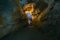 The interior of the cave. Ancient formations of stone. Touristic hiking route. Concept of excursions and attractions. Cuceler