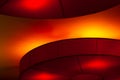 Interior ceiling red lights on dark background at night. Interior lighting concept. Red lights on ceiling. Architecture abstract Royalty Free Stock Photo