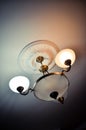 Chandelier set of lights on the ceiling in the living room, concept style, the house, life Royalty Free Stock Photo