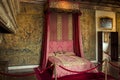 The interior of the Chenonceau castle. The main bedroom with the rich decorated walls and gobelins.