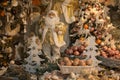 Interior of Christmas shop with decorations, santa claus and balls for wintertime