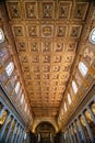 Interior of a church with an ornamental ceiling in Vatican, Italy