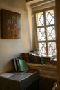 NIZHNY NOVGOROD - APRIL 18, 2023: The interior of the church with a window, icon and Orthodox religious books
