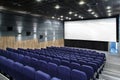 Interior cinema hall with plenty of seating and a bigÃÂ screen Royalty Free Stock Photo