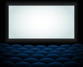 Interior of a cinema movie theatre, lecture hall with copyspace on the screen and rows of blue cinema or theater seats Royalty Free Stock Photo