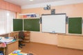Interior class at school board and teacher`s desk