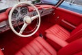 Interior of a classic vintage car, red leather Royalty Free Stock Photo