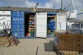 The interior of a boat repair yard, England. Boats under repair and slipways.