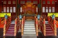 The interior of the Confucius Temple with the emperor's throne is richly decorated Royalty Free Stock Photo