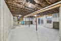 Interior construction of a house with concrete walls and the insulation of the ceiling