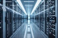 The interior of a contemporary server room features numerous data storage racks lined Royalty Free Stock Photo
