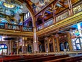 Interior of the Coptic Orthodox Church in Sharm El Sheikh with paintings on the walls.