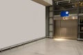 Interior corridor in hall with white wall and elevator in modern office elegant building