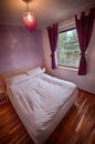 Interior of a country home bedroom. Royalty Free Stock Photo