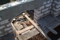 interior of a country house under construction. Site on which the walls are built of gas concrete blocks with wooden formwork Royalty Free Stock Photo