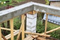 interior of a country house under construction. Site on which the walls are built of gas concrete blocks with wooden formwork Royalty Free Stock Photo