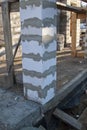 interior of a country house under construction. Site on which the walls are built of gas concrete blocks with wooden formwork Royalty Free Stock Photo