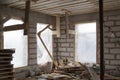 interior of a country house under construction with trim plywood. Site on which the walls are built of gas concrete blocks with Royalty Free Stock Photo
