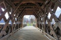 Interior of covered bridge with opening at the end. Royalty Free Stock Photo