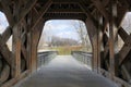 Interior of covered bridge with opening at the end. Royalty Free Stock Photo