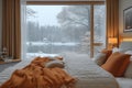 The interior of a cozy apartment: a bedroom with a huge window, an ideal place to relax and be inspired